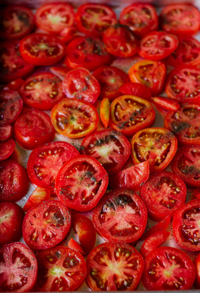 Tomatoes spread on a sheet for sundrying