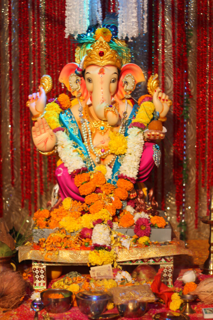 Ganesh idol beautifully decorated for Ganesh Chaturthi celebration at home