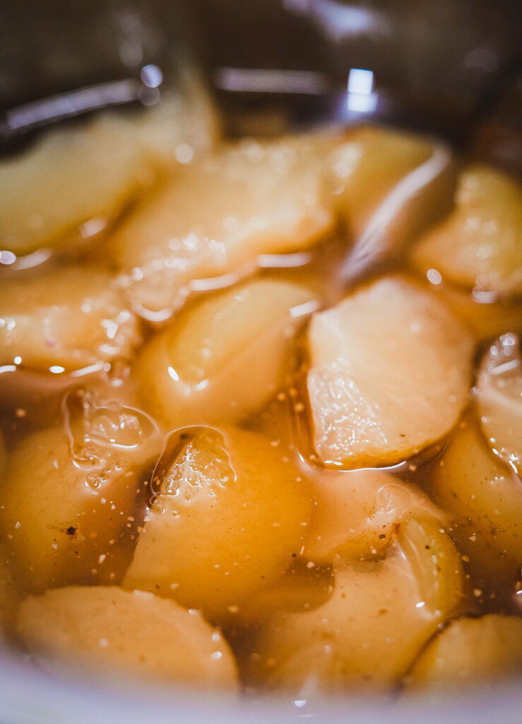 A bowl of sugar-coated amla pulp resting for two days to absorb sweetness.